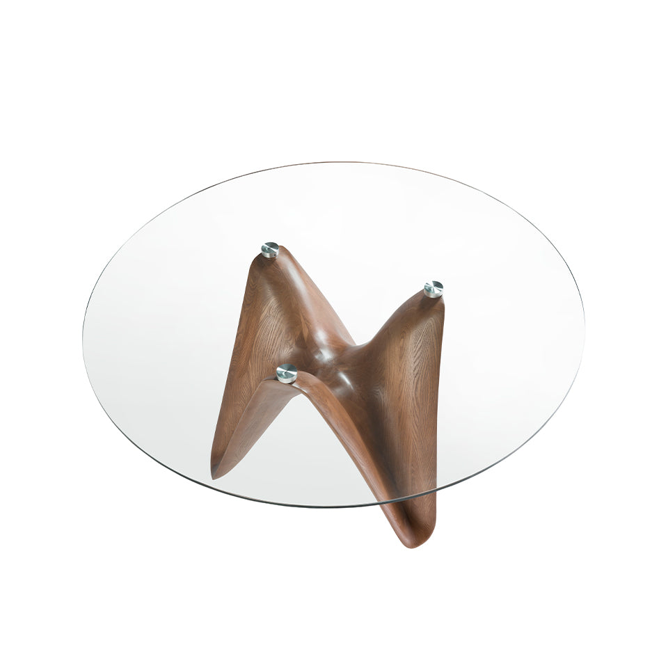 Mesa de comedor de vidrio templado con patas de nogal ø 130cm Angel Cerdá