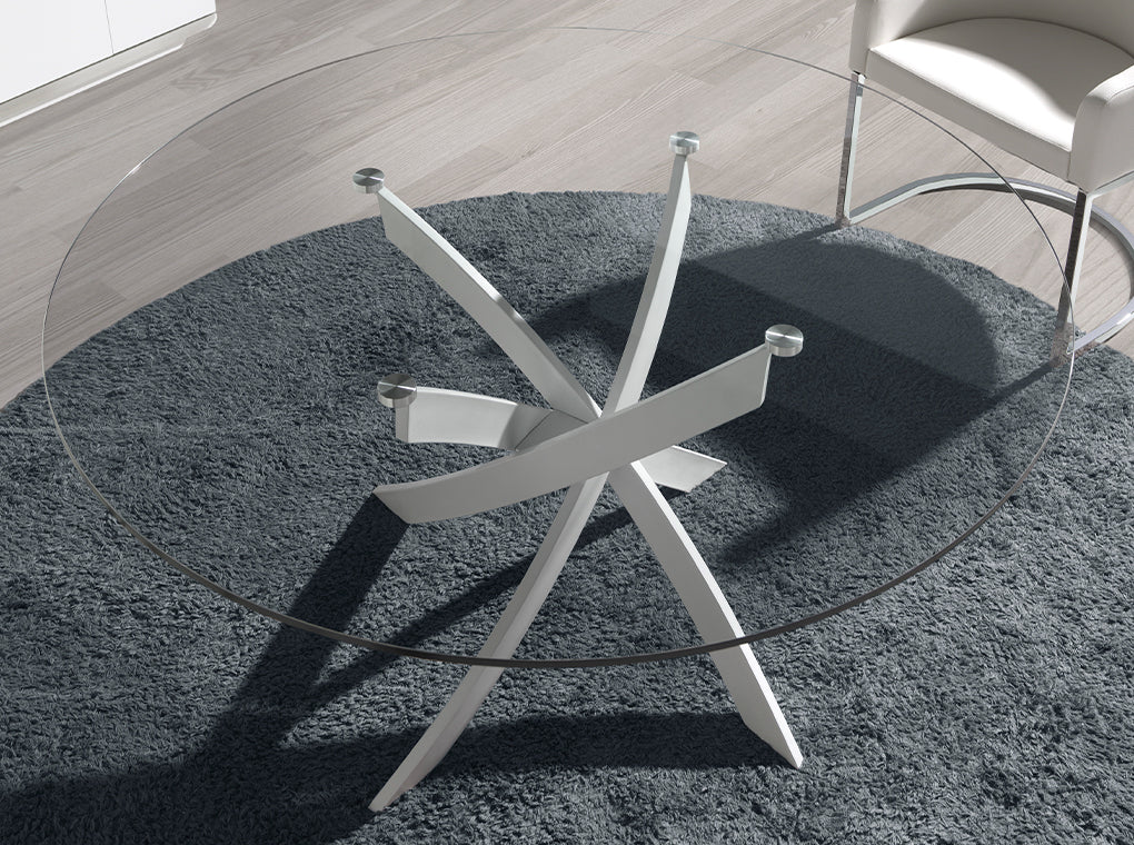Mesa de comedor redonda de vidrio con patas de acero ø140cm Angel Cerdá