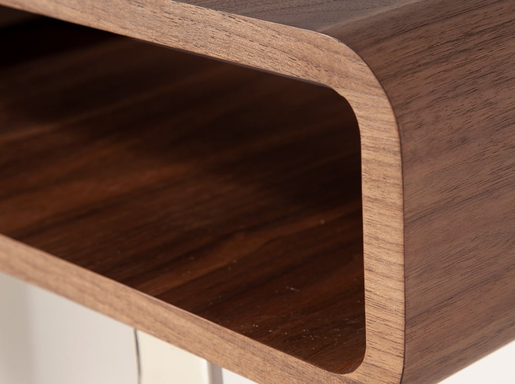 Consola con almacenamiento de nogal con diseño moderno de Angel Cerdá