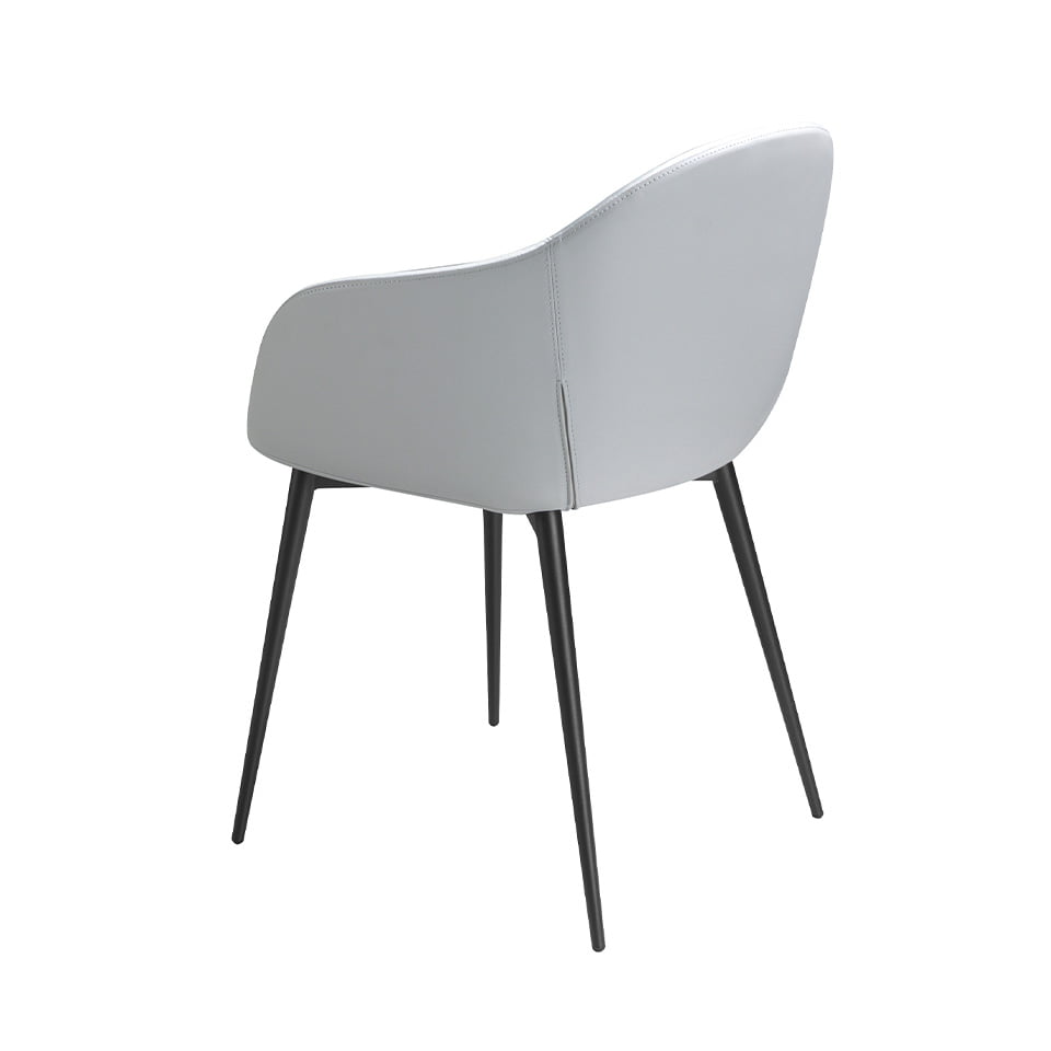 Silla tapizada con material textil y eco-cuero con patas de acero negro