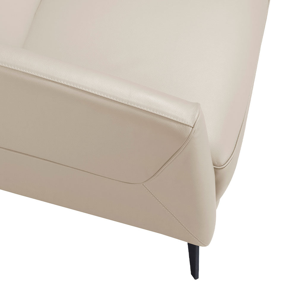 Sillón tapizado en piel gris topo de Angel Cerdá