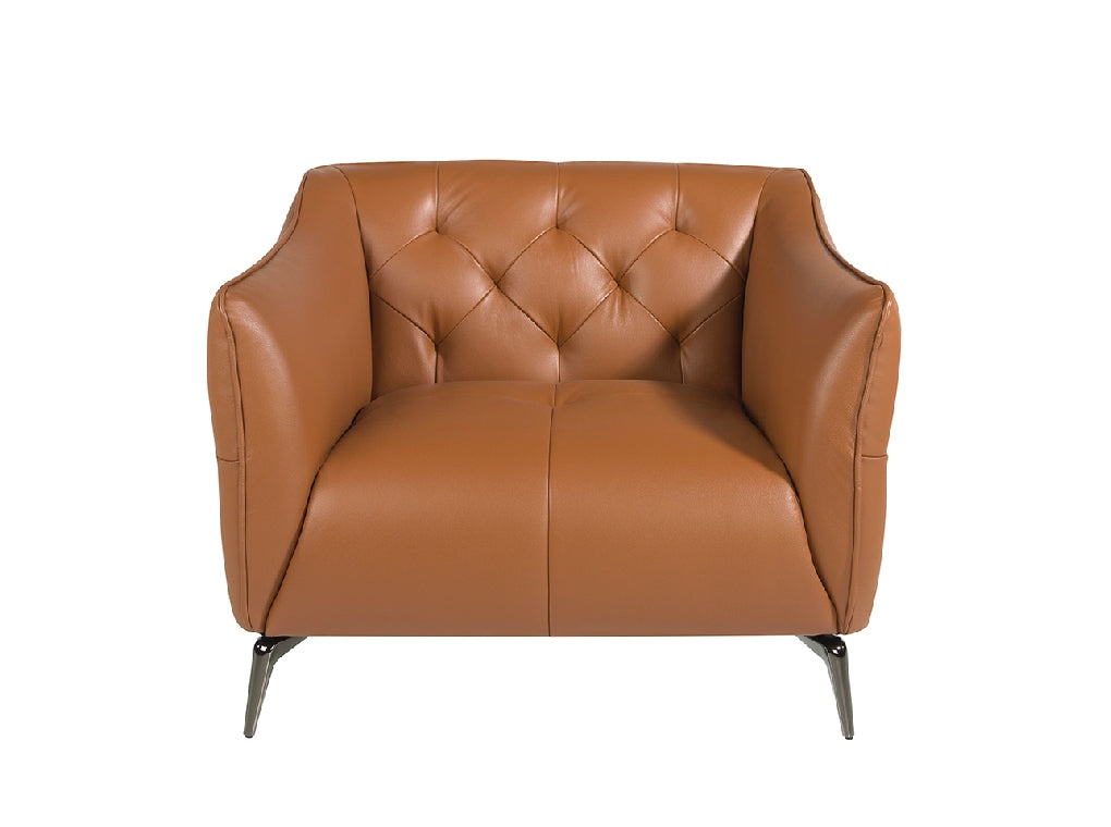 Sillón tapizado en piel marrón con modelo capitoné de Angel Cerdá