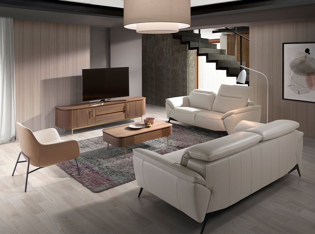 Sillón tapizado con material textil y piel ecológica con estructura de acero negro