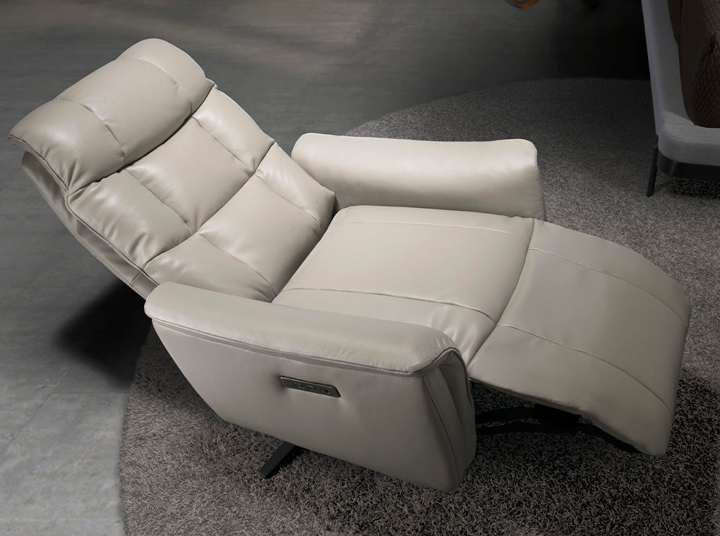 Sillón giratorio de piel gris con mecanismo eléctrico de relajación