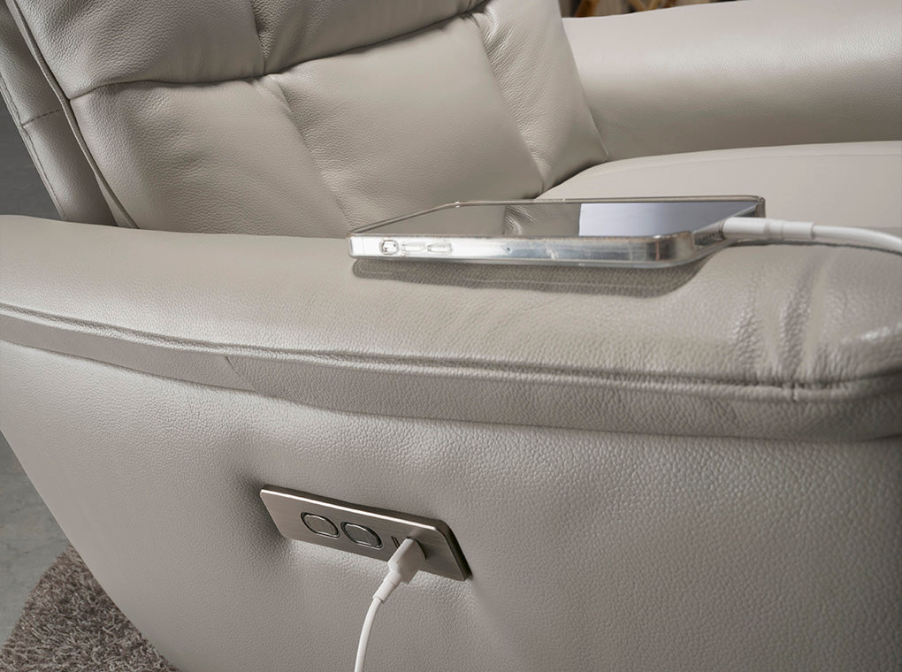 Sillón giratorio de piel gris con mecanismo eléctrico de relajación