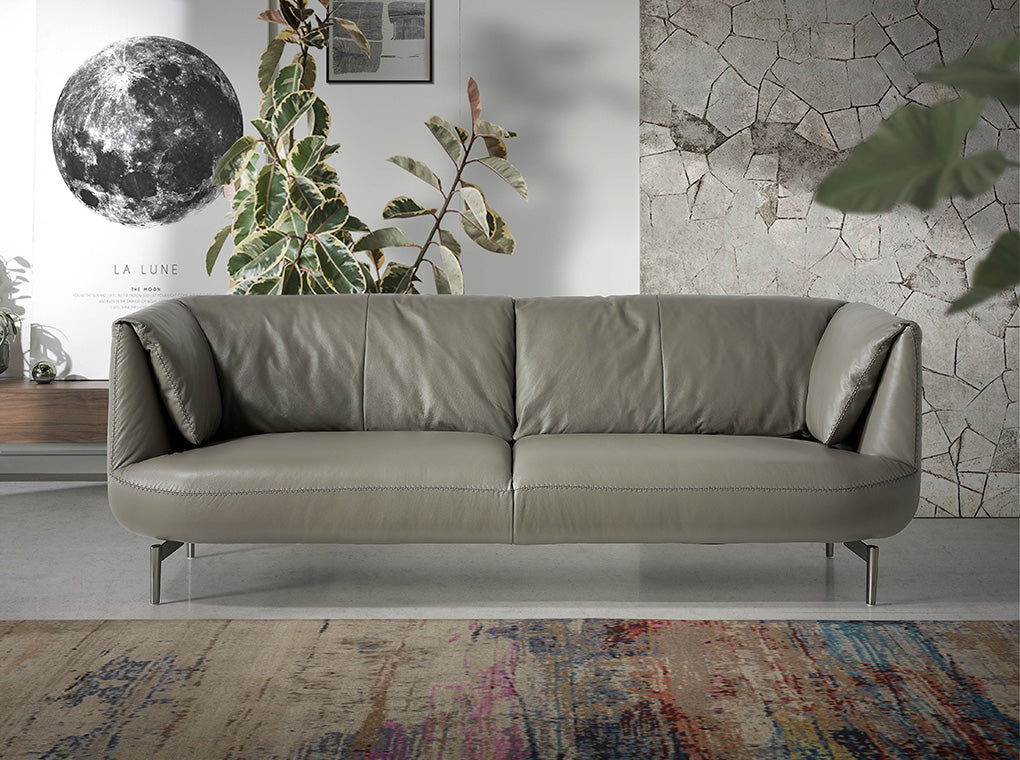 Sofá moderno de tres plazas de piel de vaca gris de Angel Cerdá