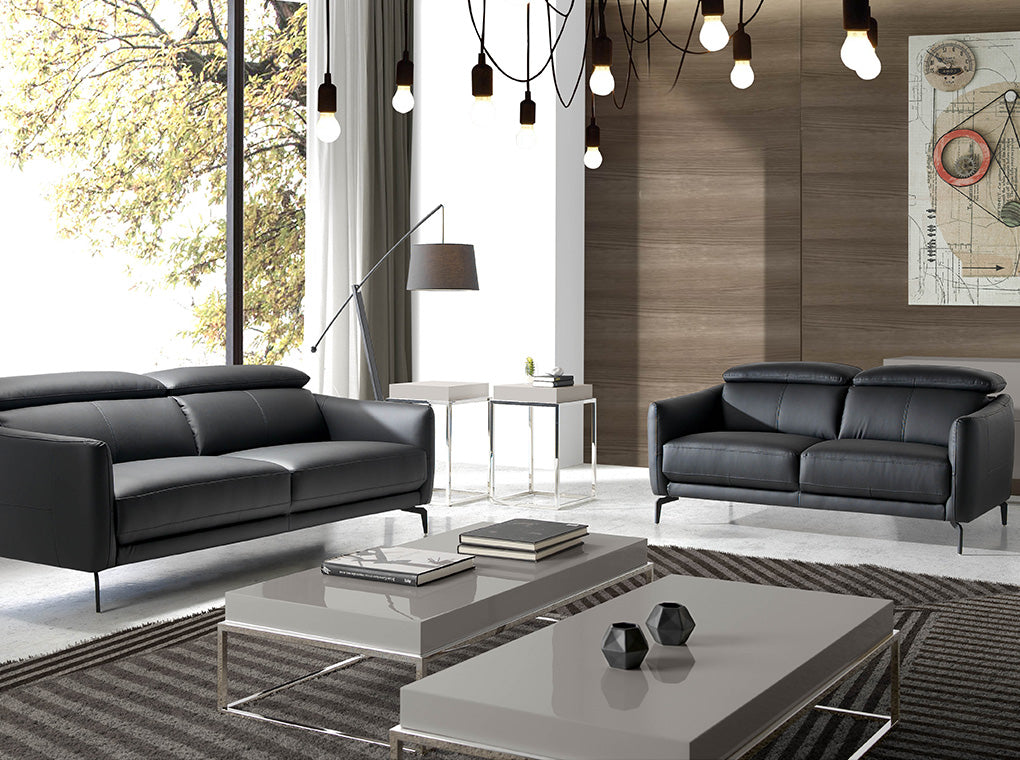 Sofá de piel negra de vaca con reposacabezas articulables Angel Cerdá