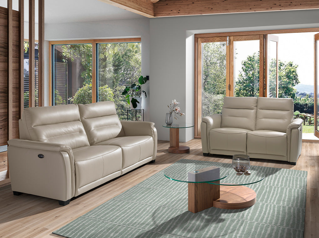 Sofá de dos plazas tapizado en piel con mecanismo de relajación Angel Cerdá
