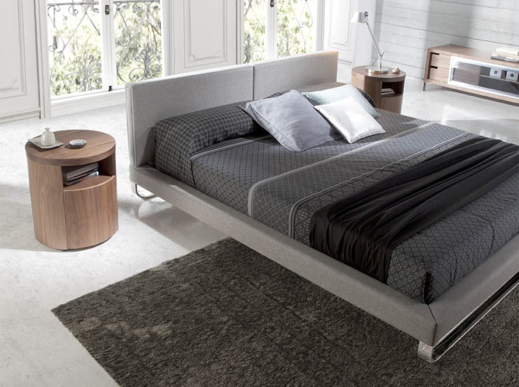 Mesa de noche redonda de nogal con cajón suave Angel Cerdá