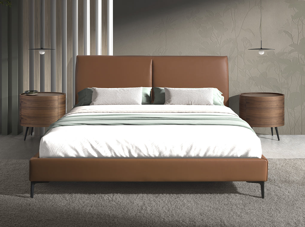 Mesa de noche ovalada de nogal con patas de acero inoxidable Angel Cerdá.