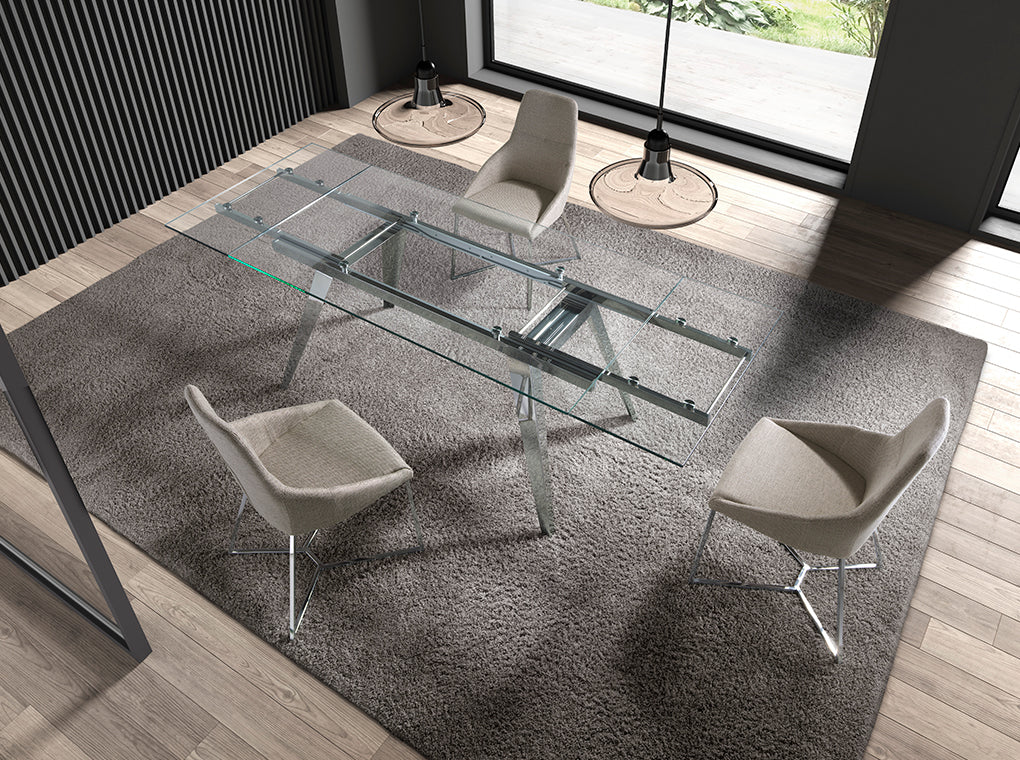 Mesa de comedor con tapa de vidrio y extensiones Angel Cerdá