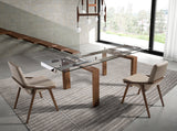 Mesa de comedor extensible de vidrio con patas de nogal 160x90cm Angel Cerdá