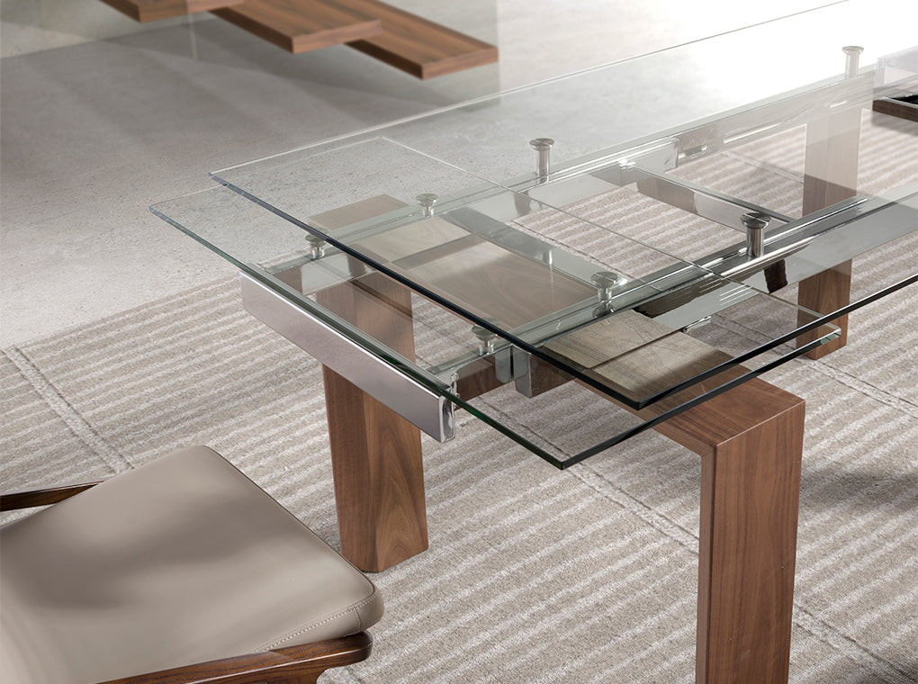 Mesa de comedor extensible de vidrio con patas de nogal 160x90cm Angel Cerdá