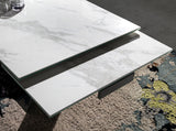 Mesa de comedor de porcelana con extensiones laterales de Angel Cerdá