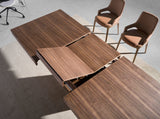Mesa extensible de comedor de nogal con soporte metálico Angel Cerdá