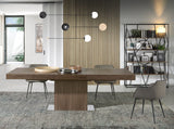 Mesa extensible de comedor de nogal con soporte metálico Angel Cerdá