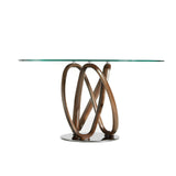 Mesa de comedor de roble con soporte metálico de Angel Cerdá.