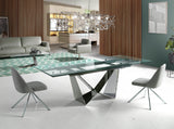 Mesa de comedor de vidrio con extensiones y patas de acero inoxidable Angel Cerdá