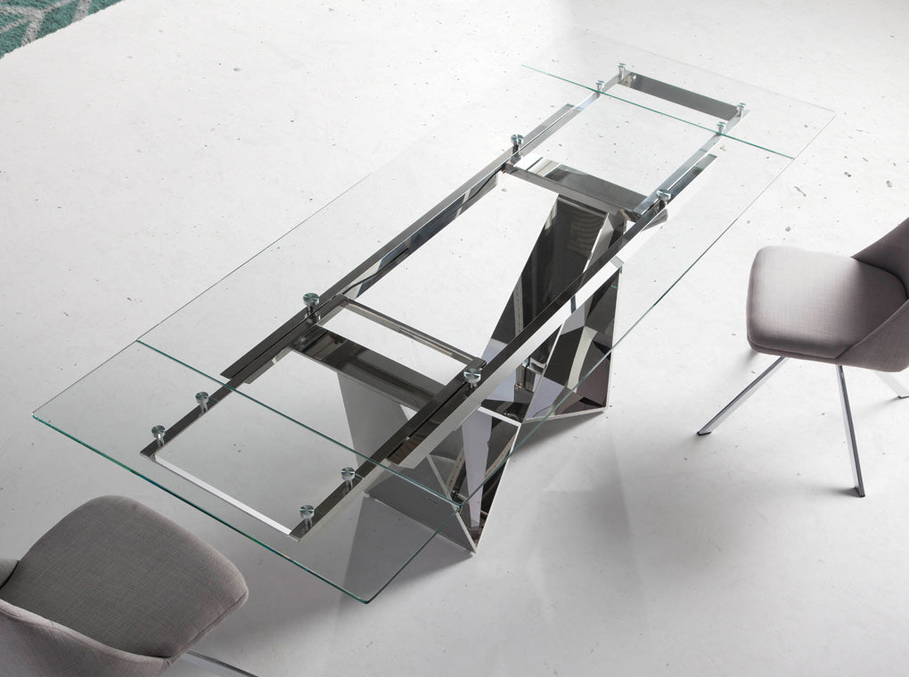 Mesa de comedor de vidrio con extensiones y patas de acero inoxidable Angel Cerdá