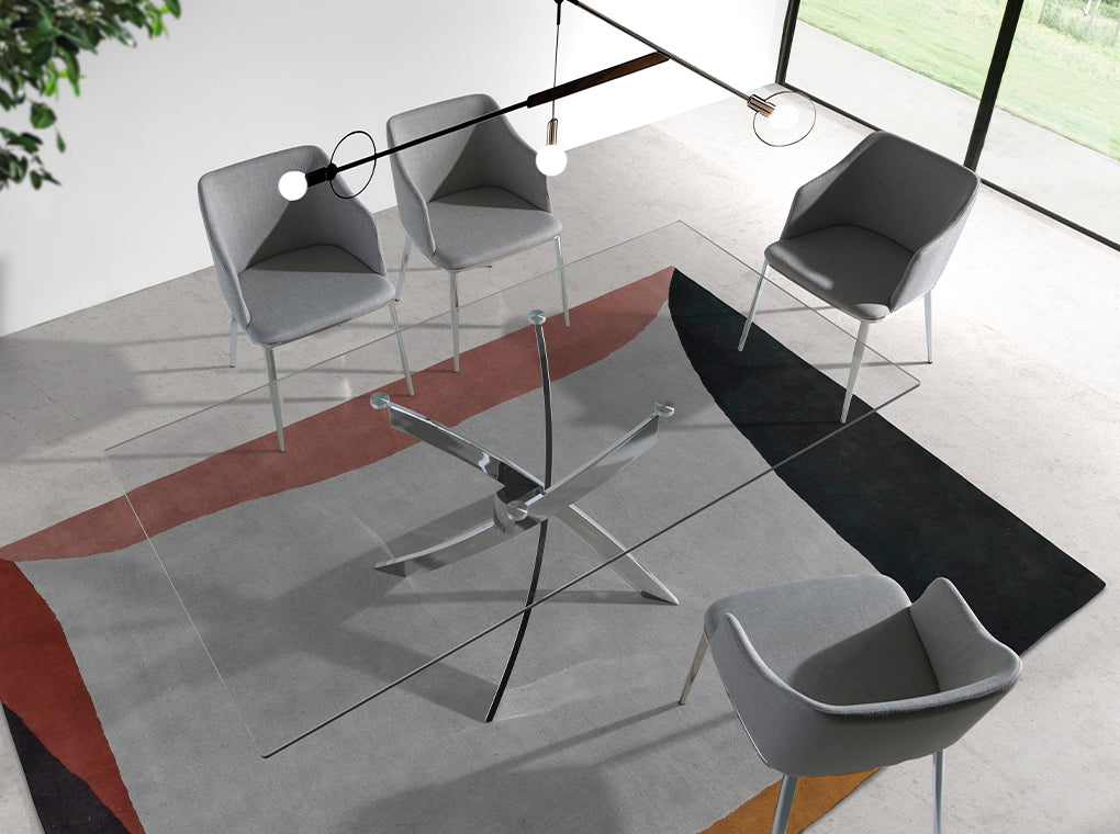 Mesa de comedor de vidrio con base de acero inoxidable Angel Cerdá
