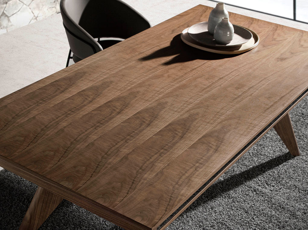 Mesa de comedor de nogal con espejo de vidrio Angel Cerdá.