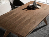 Mesa de comedor de nogal con espejo de vidrio Angel Cerdá.