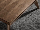 Mesa de comedor de nogal con espejo de vidrio Angel Cerdá.