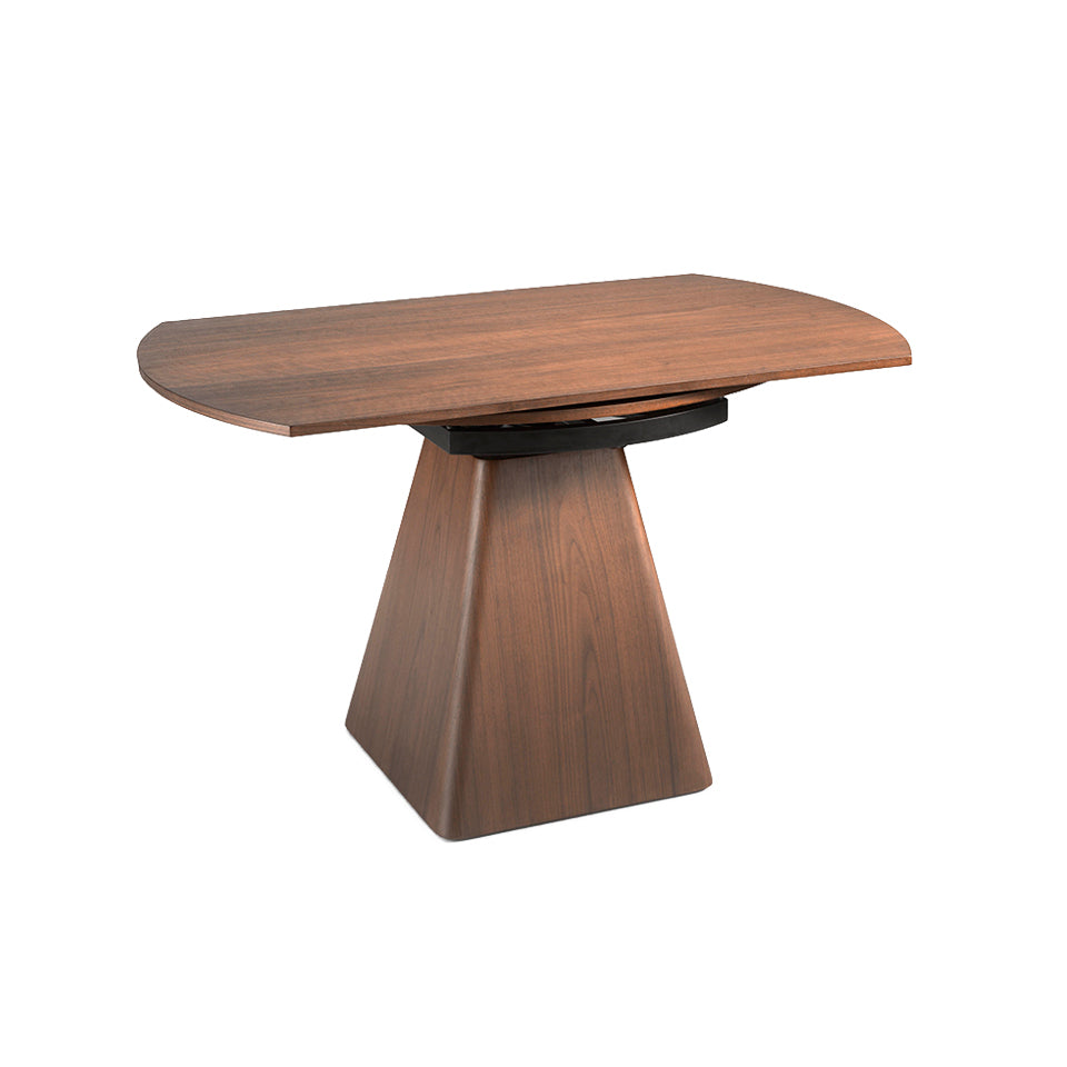 Mesa de comedor de nogal con base de pirámide cuadrada de Angel Cerdá.