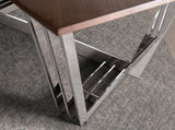 Mesa de comedor de roble con soporte metálico de Angel Cerdá.