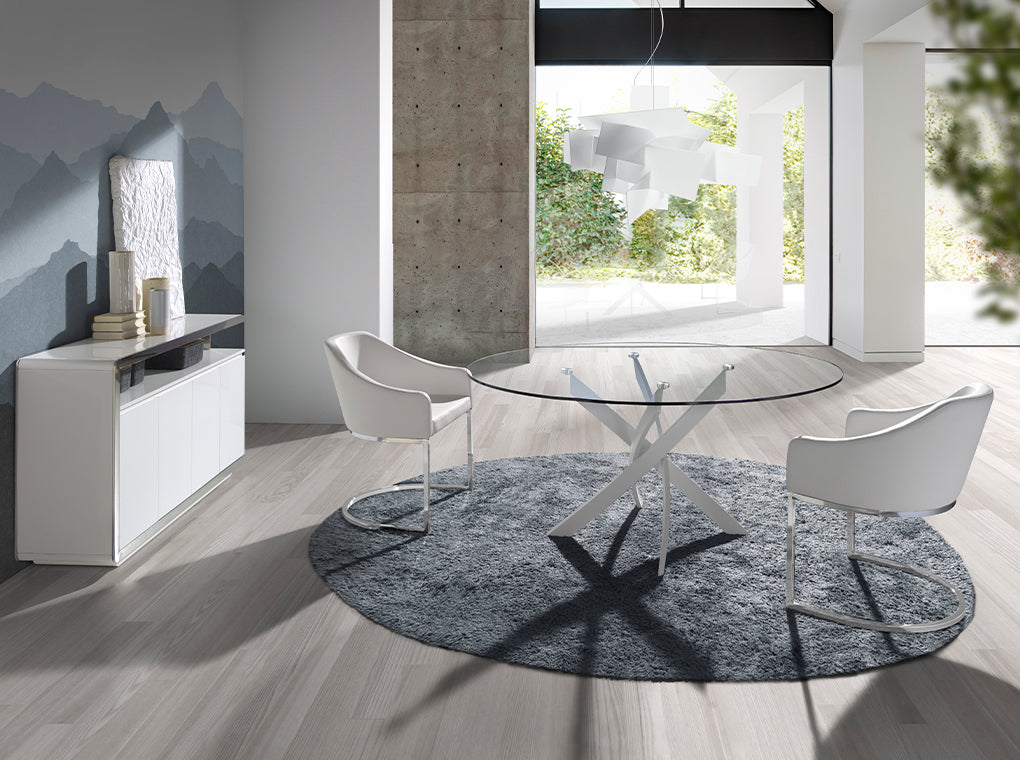 Mesa de comedor redonda de vidrio con patas de acero ø110cm Angel Cerdá