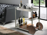 Carrito minibar de acero y nogal con diseño moderno de Angel Cerdá.