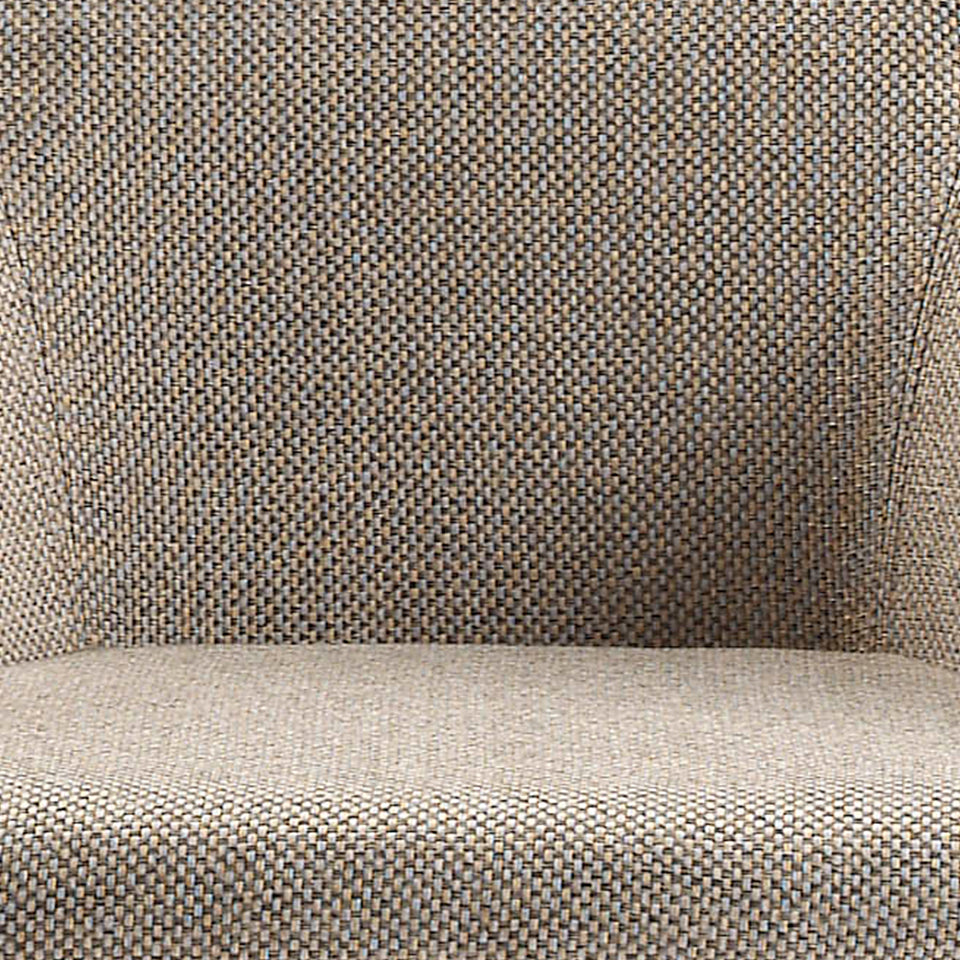 Silla de mesa tapizada en tela marrón de Angel Cerdá