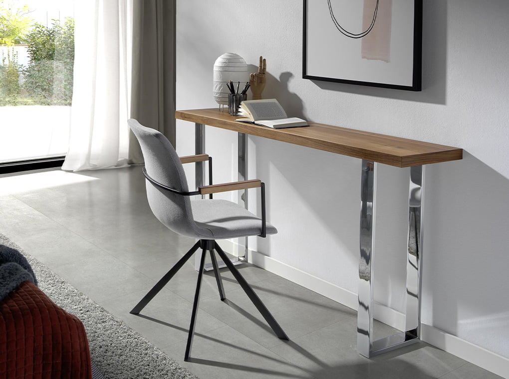 Silla giratoria tapizada con material textil gris Angel Cerdá