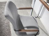 Silla giratoria tapizada con material textil gris Angel Cerdá