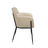 Silla de comedor tapizada en piel ecológica con patas de acero negro Angel Cerdá.