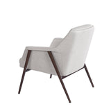 Sillón tapizado blanco con estructura de acero marrón