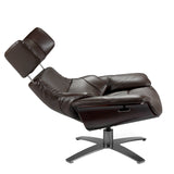 Sillón giratorio tapizado en piel marrón chocolate de Angel Cerdá