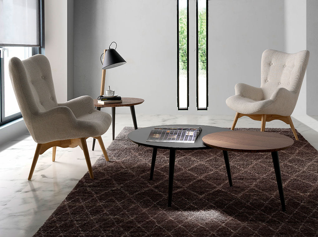 Sillón tapizado con material textil con acabado capitoné Angel Cerdá