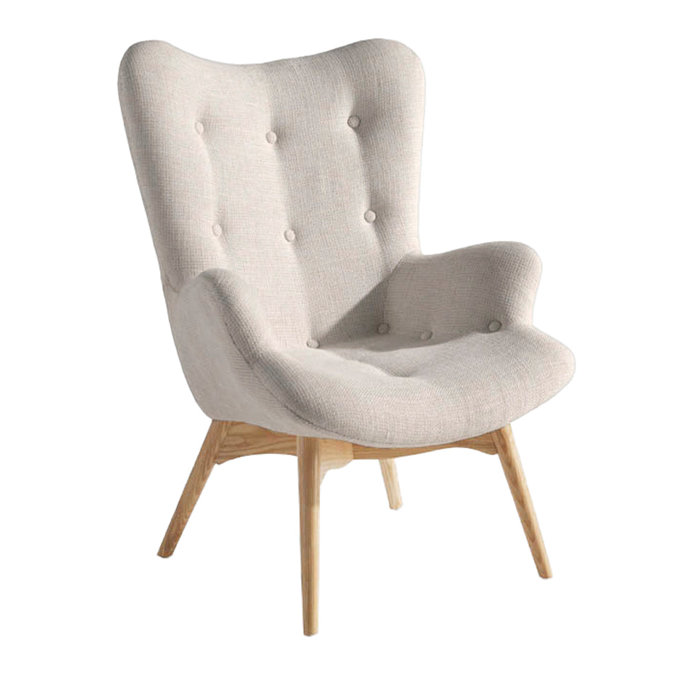 Sillón tapizado con material textil con acabado capitoné Angel Cerdá