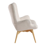Sillón tapizado con material textil con acabado capitoné Angel Cerdá