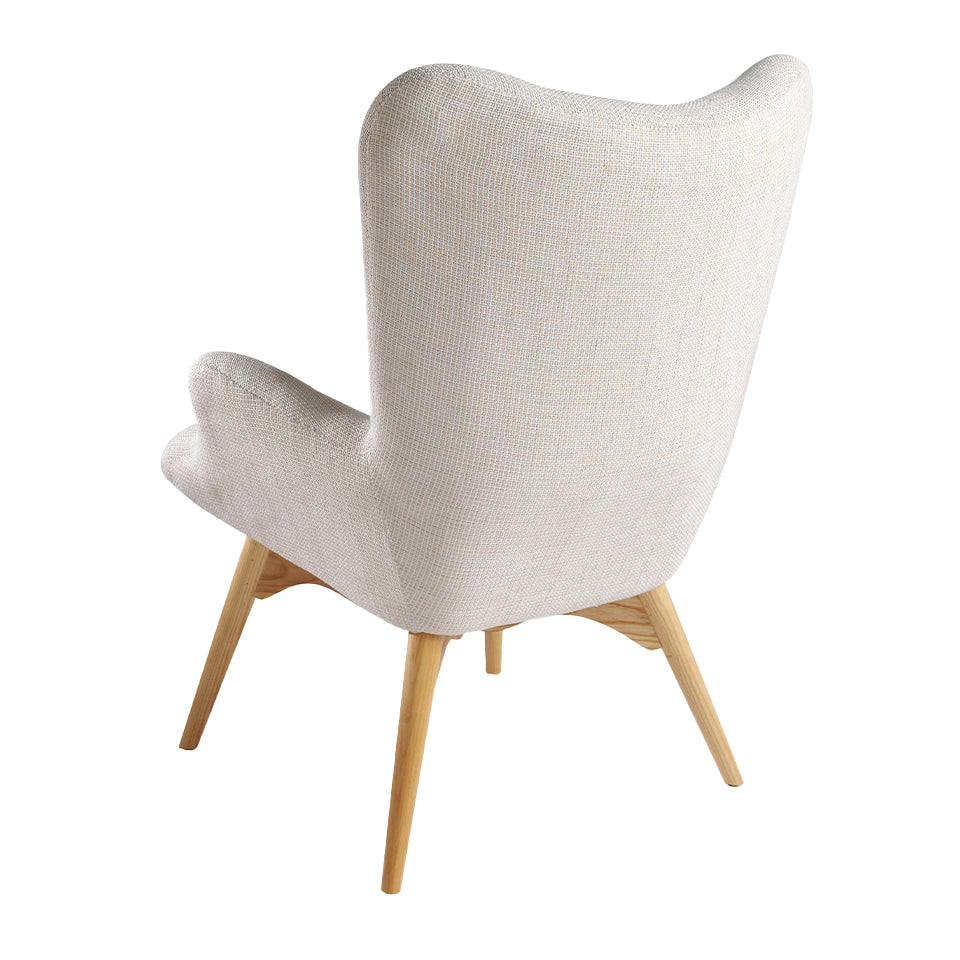 Sillón tapizado con material textil con acabado capitoné Angel Cerdá