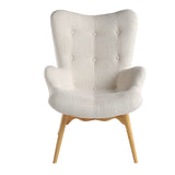 Sillón tapizado con material textil con acabado capitoné Angel Cerdá