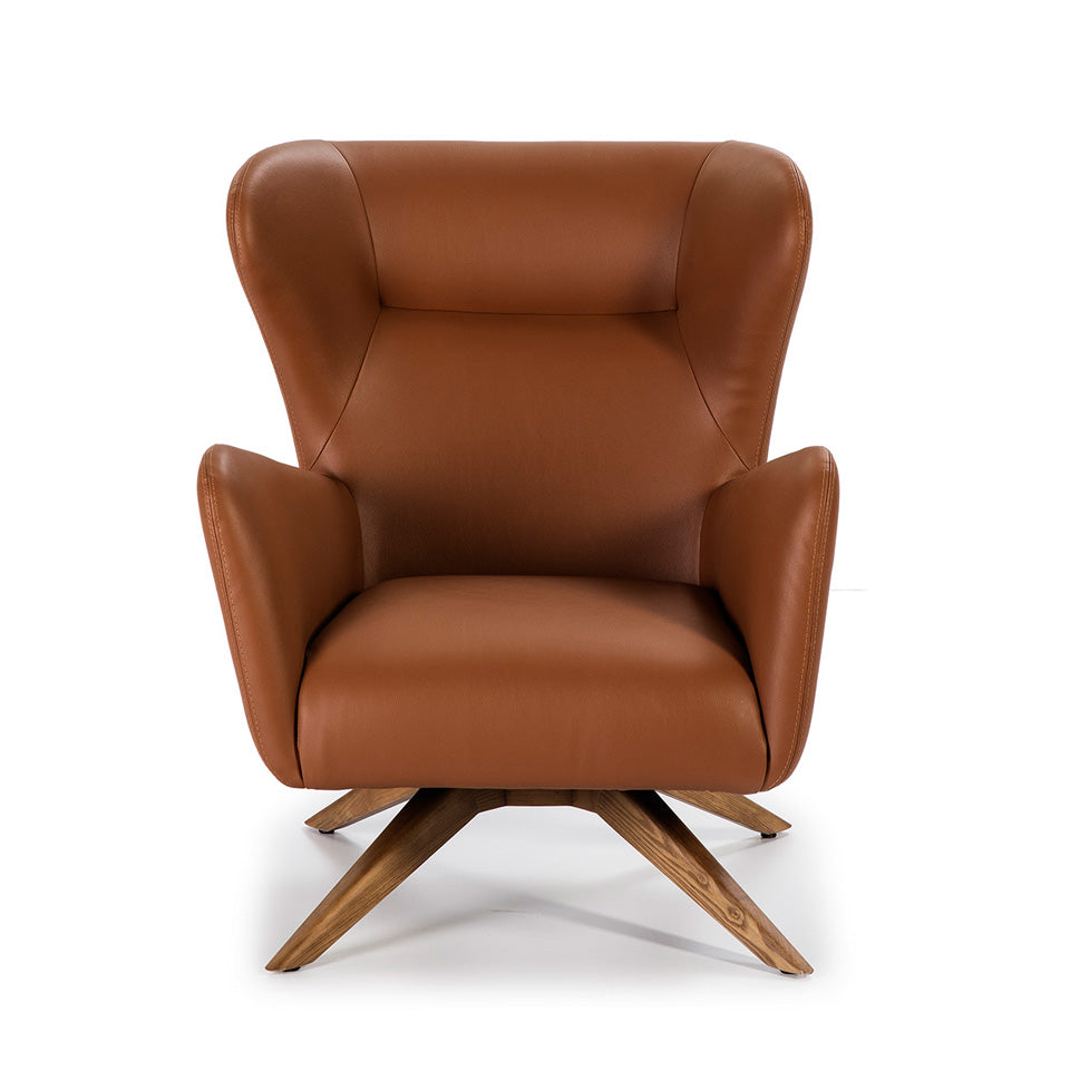 Sillón giratorio tapizado en piel ecológica marrón de Angel Cerdá