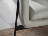 Sillón tapizado en piel de vaca gris Angel Cerdá