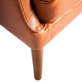 Sillón Chester de piel marrón con estructura de madera de nogal de Angel Cerdá