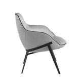 Sillón tapizado en tela gris y estructura de acero negro Angel Cerdá