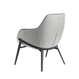 Sillón tapizado en tela gris y estructura de acero negro Angel Cerdá