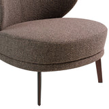 Sillón tapizado en material marrón Vello de Angel Cerdá