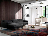 El sofá con chaise longue de cuero negro de vaca Angel Cerdá.