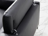 El sofá con chaise longue de cuero negro de vaca Angel Cerdá.